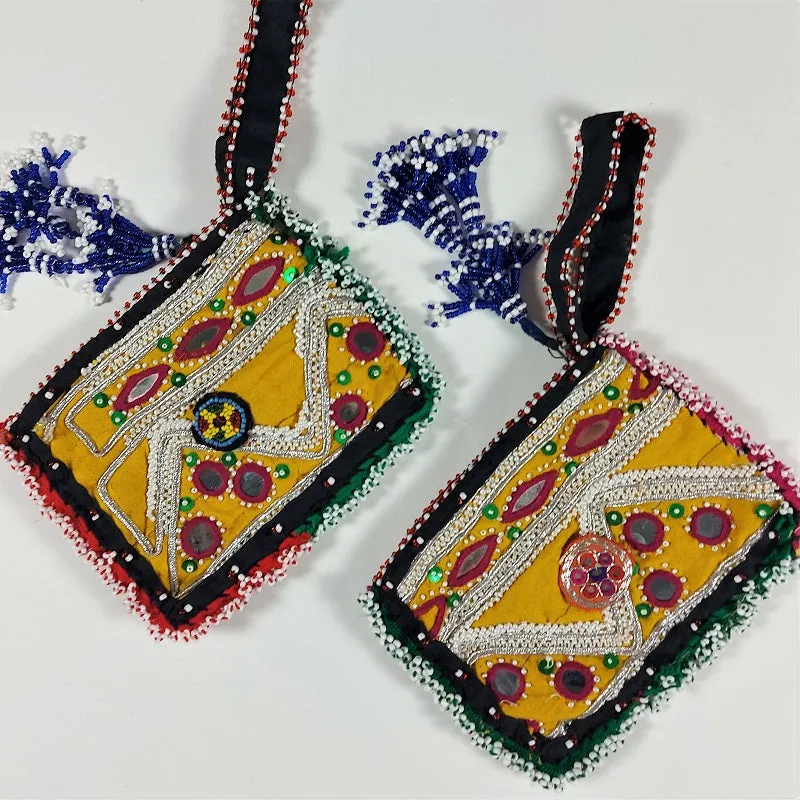Cute Kuchi mini clutch bag with traditional embroidery