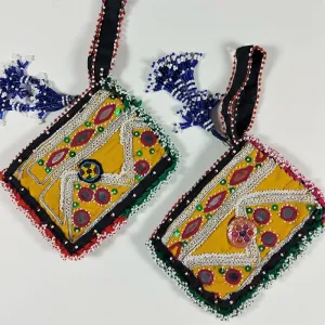 Cute Kuchi mini clutch bag with traditional embroidery