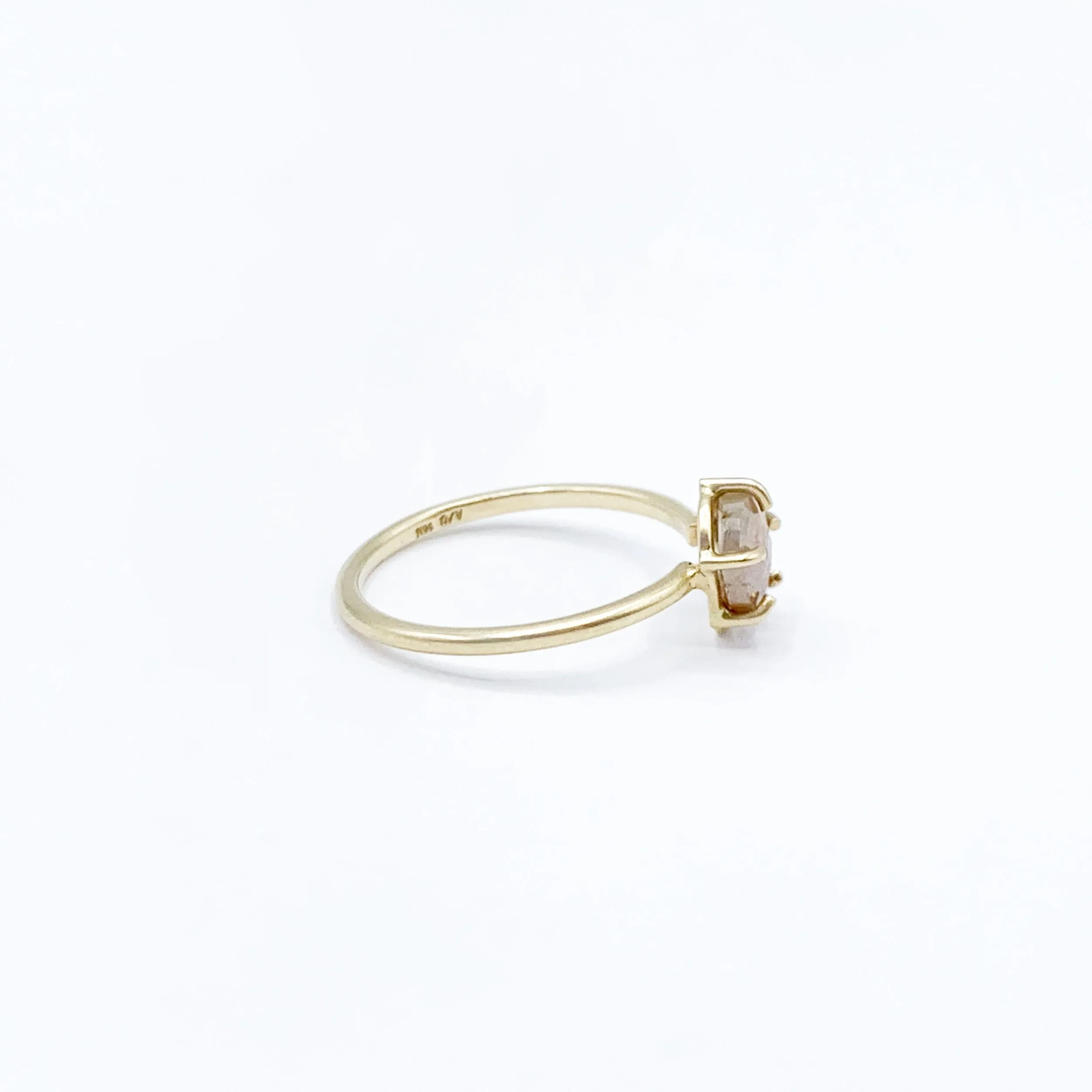 Delicate Pastel Diamond Captured in Gold