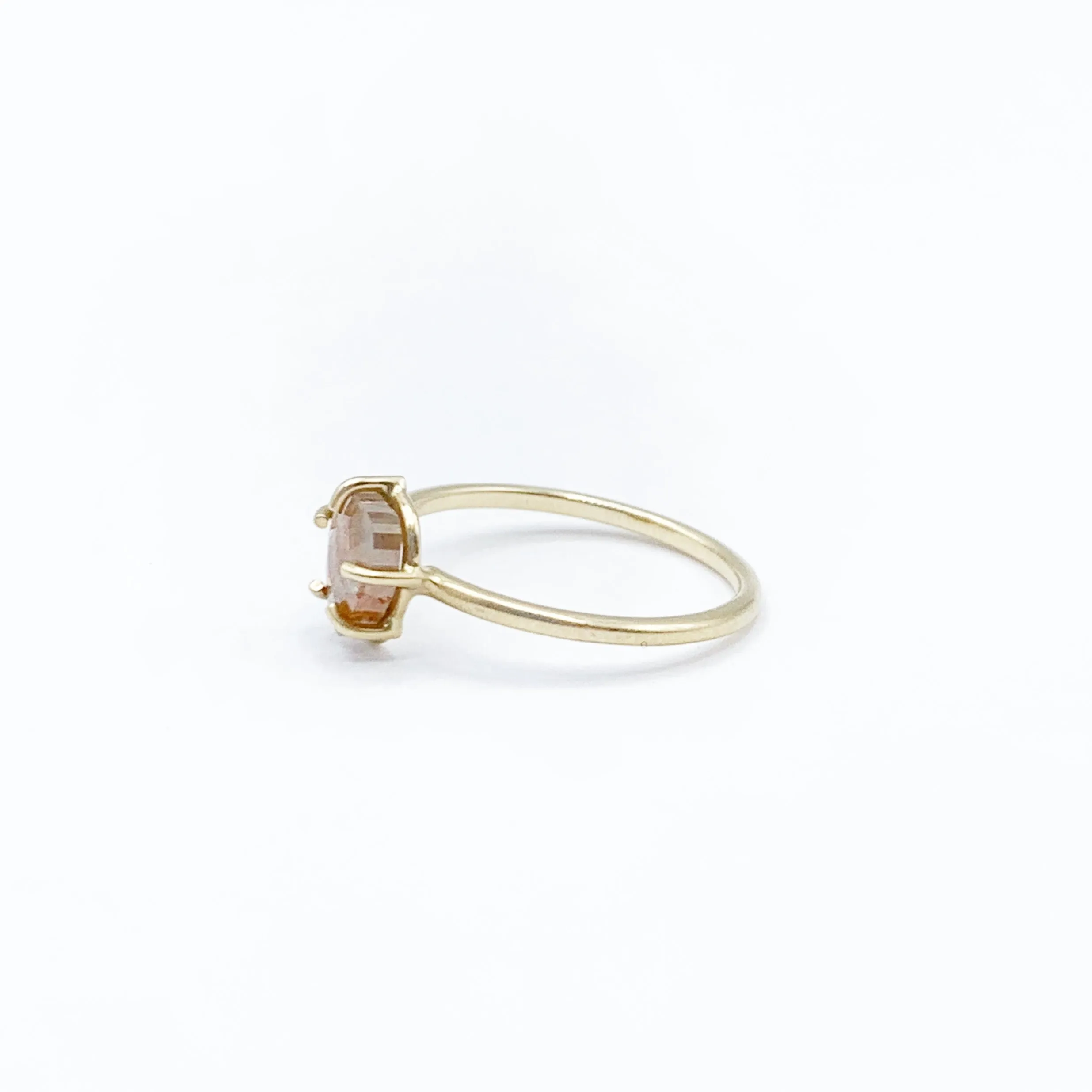 Delicate Pastel Diamond Captured in Gold