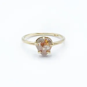 Delicate Pastel Diamond Captured in Gold