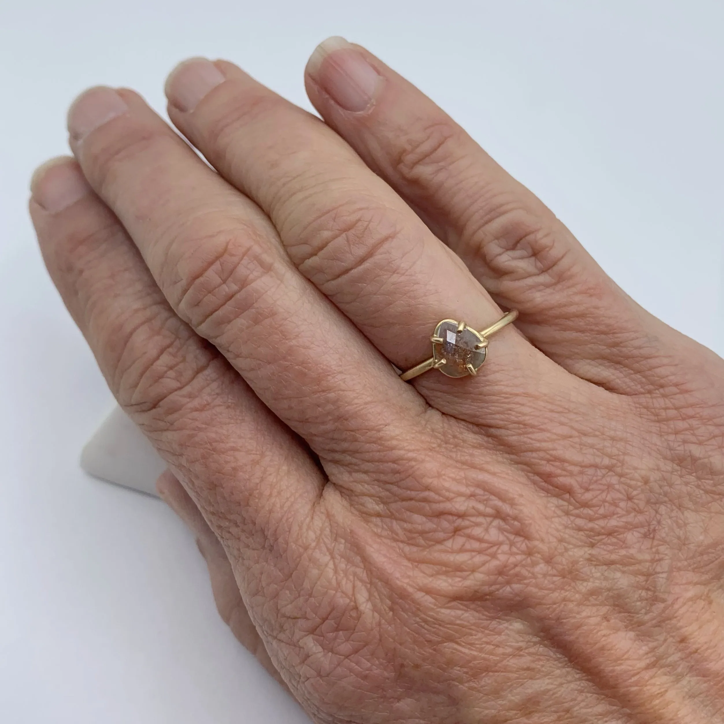 Delicate Pastel Diamond Captured in Gold