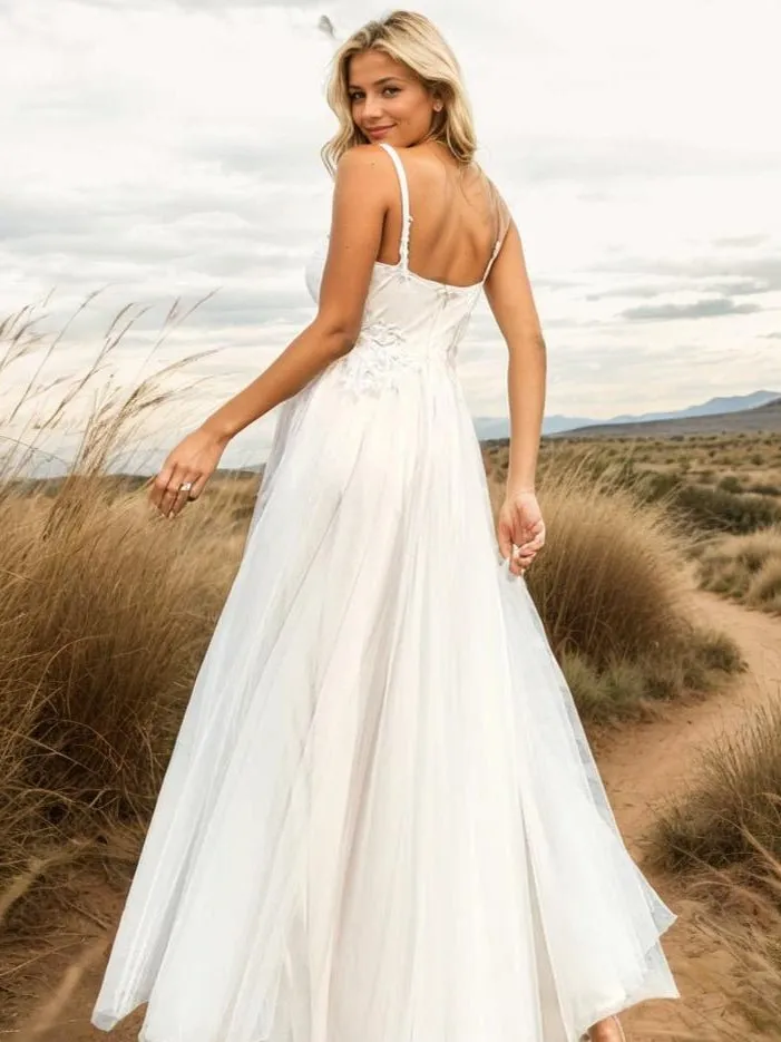Gloria Ivory/nude tulle wedding gown with beading