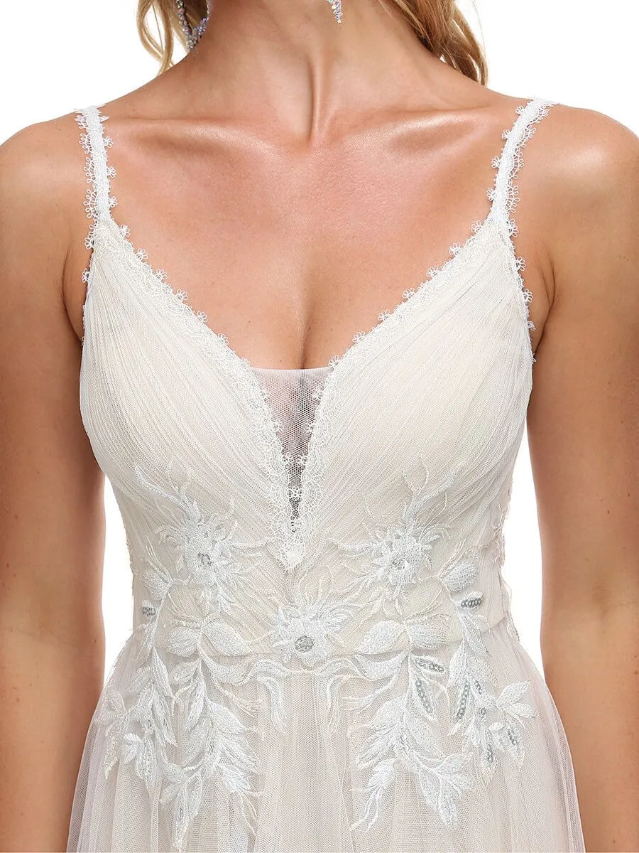 Gloria Ivory/nude tulle wedding gown with beading