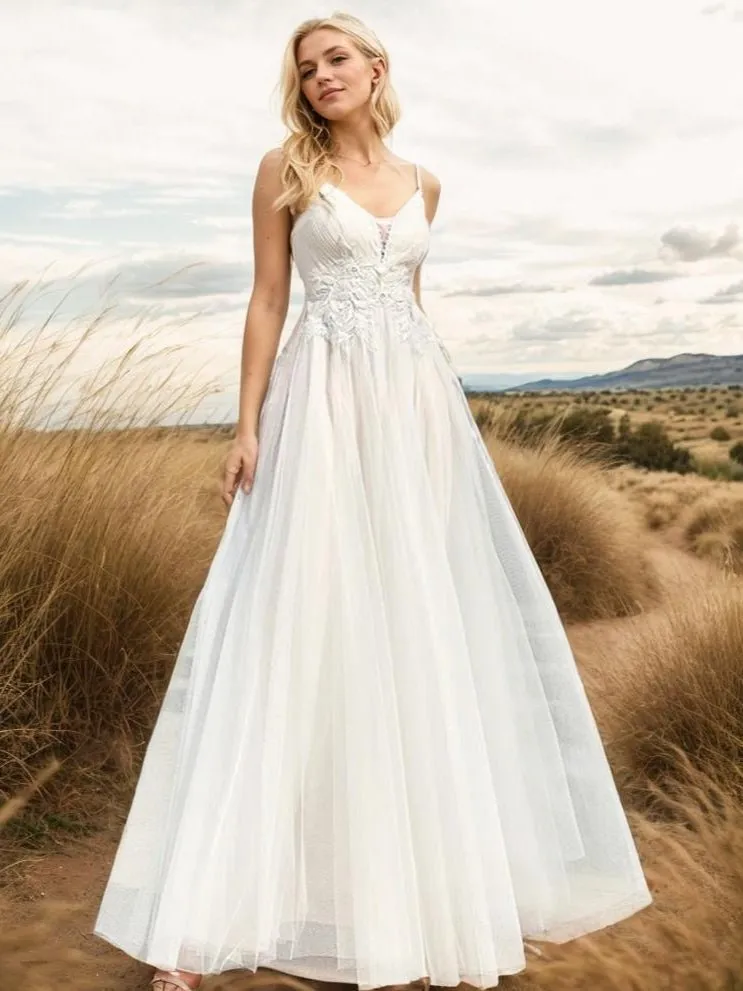 Gloria Ivory/nude tulle wedding gown with beading
